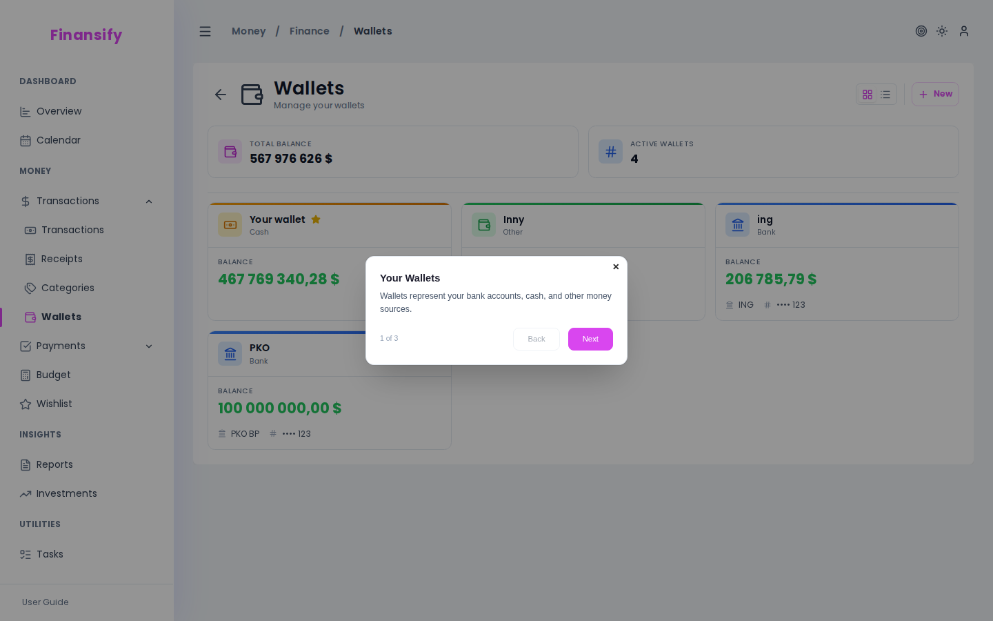 Wallet list in card view — 3 wallets: "Main account" (bank, with star), "Savings" (bank), "Cash" (cash). Each card with balance and type