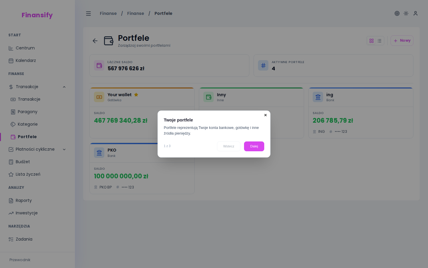 Dialog usuwania portfela — wybór: "Przenieś transakcje do innego portfela" (dropdown) lub "Usuń wszystkie transakcje"